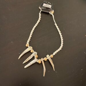 2 for $10 Funky necklace featuring dinosaur type teeth